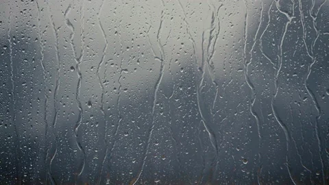 Rainy days ,heavy rain falling on the window surface Video stock 150321445