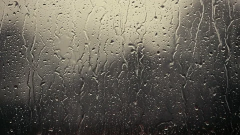 Rainy days ,heavy rain falling on the window surface Stock Footage