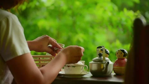 On rainy days, it's nice to have a hot cappuccino on the terrace. Stock Footage 160669669