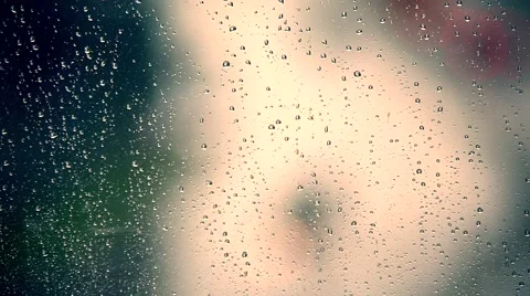 Rainy days, Rain drops on window with blurred traffic ,rainy weather, Stock Footage 53830569