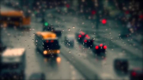 Rainy days, Rain drops on window with blurred traffic ,rainy weather, Stock Footage 53839566