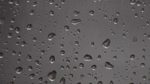 Rainy days, rain drops on window surface Video stock 73316962