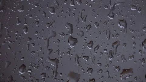 Rainy days, rain drops on window surface Stock Footage 73317167