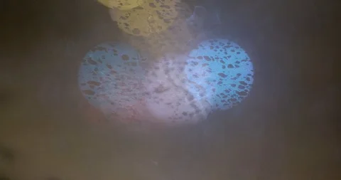 Rainy days, rain drops on window surface and colorful traffic bokeh light. Stock Footage 88731809