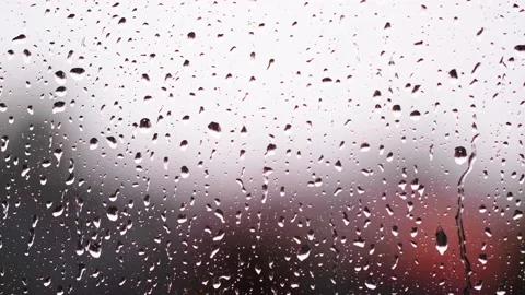 Rainy days .rain falling on window surface Stock Footage 139770150