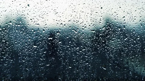 Rainy days,rain drops on the window surface Stock Footage 136567349