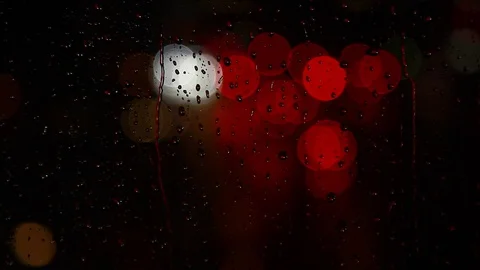 Rainy days,rain drops on the window with traffic bokeh Video stock 69835418