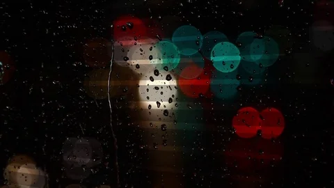 Rainy days,rain drops on the window with traffic bokeh Video stock 69845542