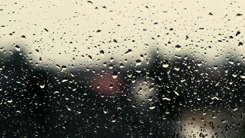 Rainy days,rain falling on the window surface Stock Footage 144932483