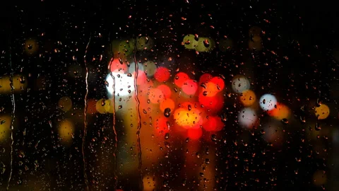 Rainy days.rain falling on the window surface Stock Footage 166386227