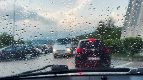 Rainy Drive: Car Windshield View of Traffic Ahead Video stock 343658062