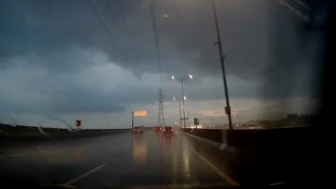 Rainy evening drive on a highway Video stock 279718937