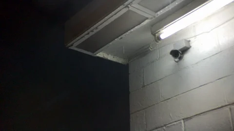 Rainy Gas Station Security Camera at night Stock Footage 100612639