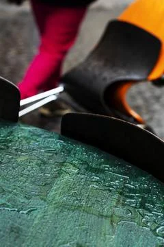 Rainy Green Cafe Table with Yellow and Black Chairs Stock Photos