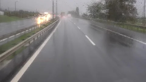 Rainy Highway Drive Windshield View on a Stormy Day Stock Footage 313426474