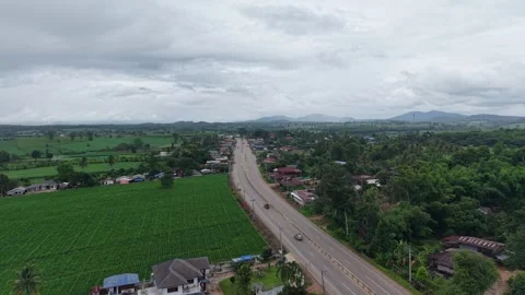 Rainy Landscape With Fields, Forest, and Distant Mountains Stock Footage 311994711