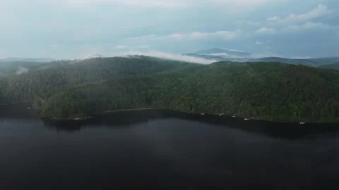Rainy mist low clouds sunset Lake Schroon aerial drone Steep Bay Town of Stock Footage 340964597