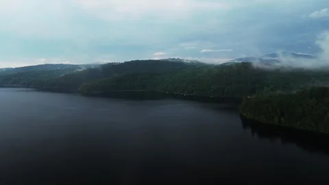 Rainy mist low clouds sunset Lake Schroon aerial drone Steep Bay cove Town of Stock Footage 340964610