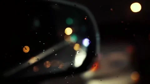 Rainy Night Car Mirror Bokeh Lights Stock Footage 345960644