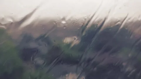 Rainy night city atmosphere with falling rain behind the window Stock Footage 340955283
