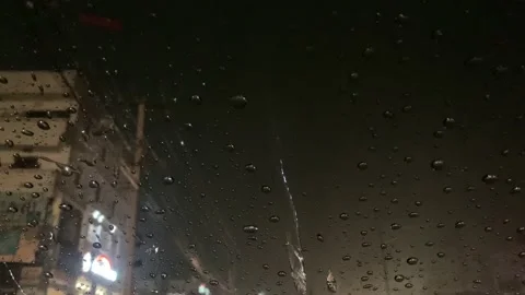 Rainy Night City Lights Through Car Windshield Video stock 239998569