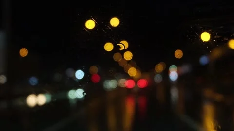 Rainy night drive car windshield in traffic Stock Footage 164240485