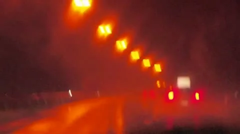 Rainy night high speed driving Stock Footage 12420924