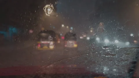 Rainy Night Mumbai Traffic View Through Windshield - Water Drops on Glass Vídeo Stock 345656196