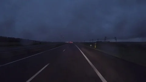 Rainy night road Stock Footage 80278345