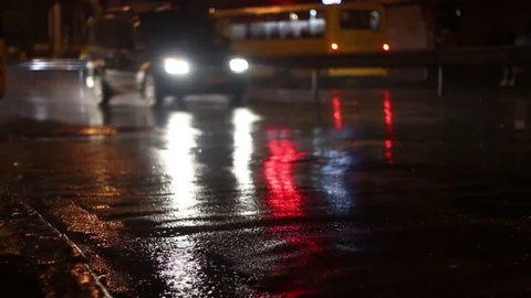 Rainy night traffic Stock Footage 72382467