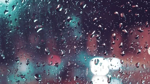 Rainy night traffic passing by Stock Footage 88223390