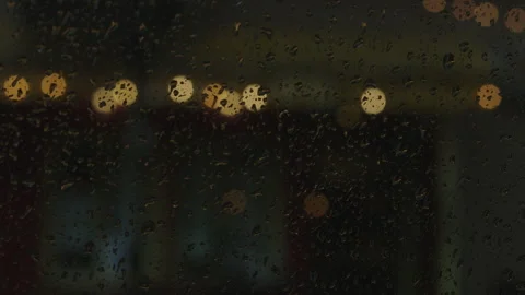 Rainy nyc night car window pov city lights flicker through drive Stock Footage 251214249