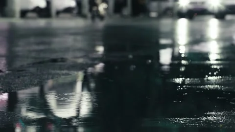 Rainy pavement - waterlogged splashes Stock Footage 257863113