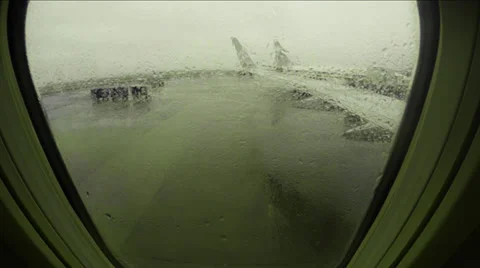 Rainy plan window at airport Stock Footage 38726958