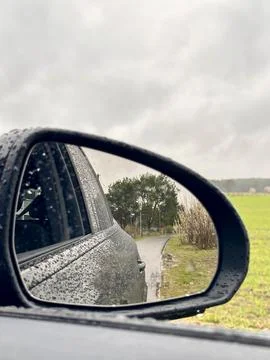 Rainy Reflection in Car Side Mirror Stock Photos