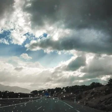 Rainy road surface Stock Photos