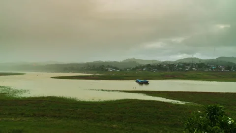 Rainy season, clouds flowing through mountains, villages. Video stock 156945465