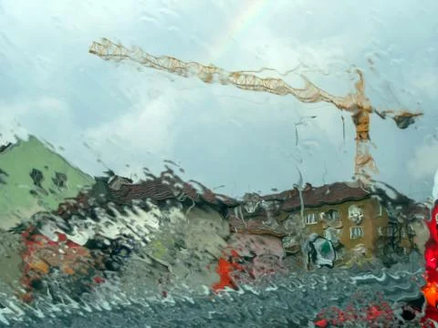 Rainy Sofia - multicolored houses and a crane. Stock Photos