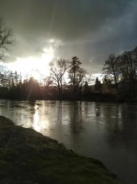 Rainy spring day by the river Foto stock