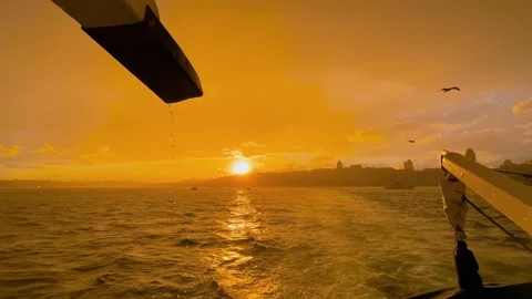 Rainy sunset over the Bosphorus from ferry stern in Istanbul Stock Footage 346542277
