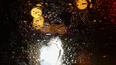Rainy traffic blur in the evening 4k 25fps video Stockbeeldmateriaal 259296785
