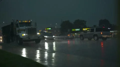 Rainy traffic with transit. Stock Footage