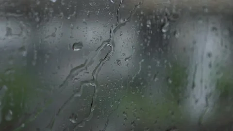 Rainy Train Ride with Raindrops on Window Glass Stockbeeldmateriaal 314534309