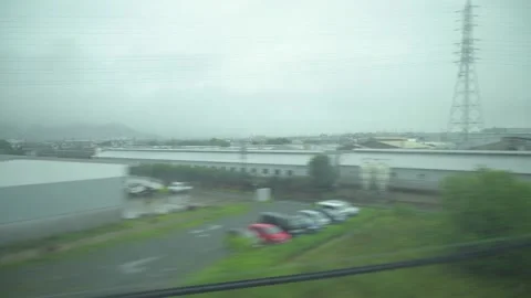 Rainy view from a bullet train Shinkansen in Japan. Stock Footage 136509002