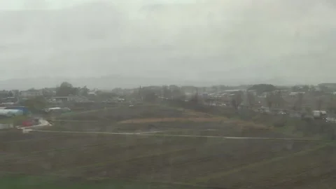 Rainy view from inside a train window Stock Footage 332883211