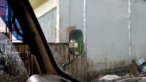 Rainy View Through Car Window Near Urban Alley Scene Stock Footage 304431976