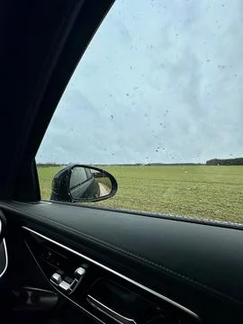 Rainy View Through Car Window Stock Photos