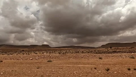 Rainy weather and cloudy sky over desert road. car driver pov Stock Footage 278955873