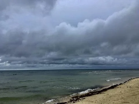 Rainy weather cloudy view at the beach shore Stock Photos