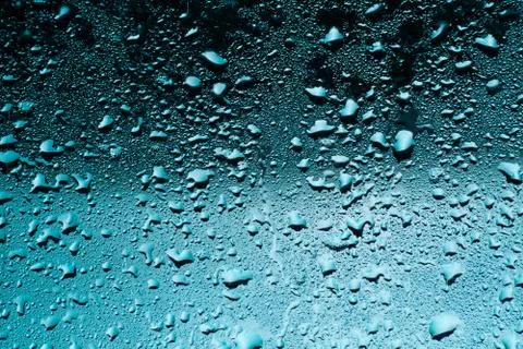 Rainy window. Drops on the glass Stock Photos